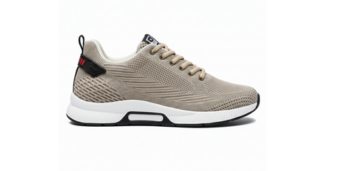 Beige sneaker with white sole on a white background