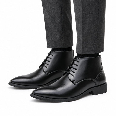 Ashford black leather elevator dress boots with pointed toes and a discreet height boost for polished formal style