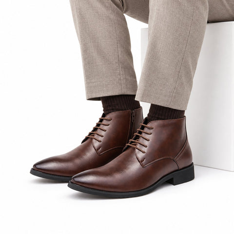 Ashford mens dress boots in polished brown leather with lace up fronts and a discreet height boost styled with tailored trousers