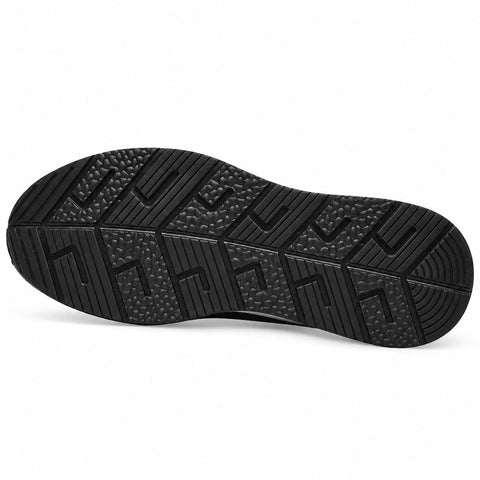 Elevate33 black outsole with durable geometric traction pattern for an elevated shoe designed for confident everyday wear and discreet height boost