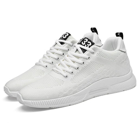 Elevate33 white casual sneakers with breathable knit upper and modern design, featuring discreet height boost and hidden lift for everyday comfort and style.