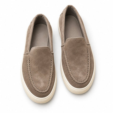 Ellison taupe suede slip on casual shoes with moccasin stitching and textured white rubber soles shown from above
