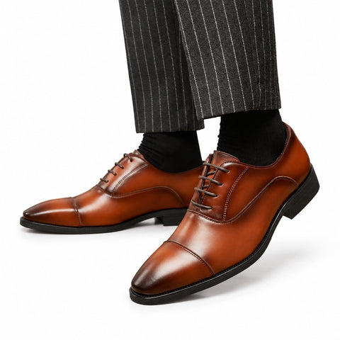 Regal brown leather mens dress shoes with cap toes lace up styling polished finish and a discreet height boost for refined formal wear