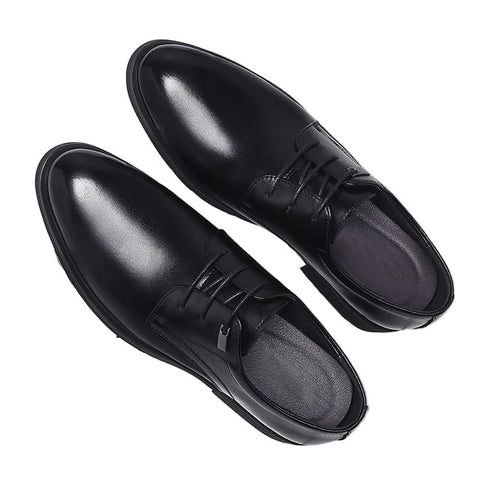 Pair of sleek black Regent men's dress shoes with a polished finish, featuring discreet internal lift for a subtle height boost and comfortable insoles for everyday wear.