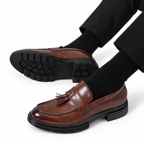 Sterling brown leather dress loafers with tassel detailing and a discreet height boost for polished men’s dress style