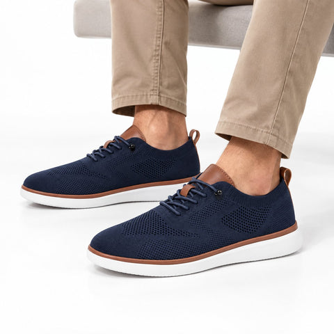 Strider blue men's casual shoes with breathable knit uppers on cushioned white soles for a discreet height boost
