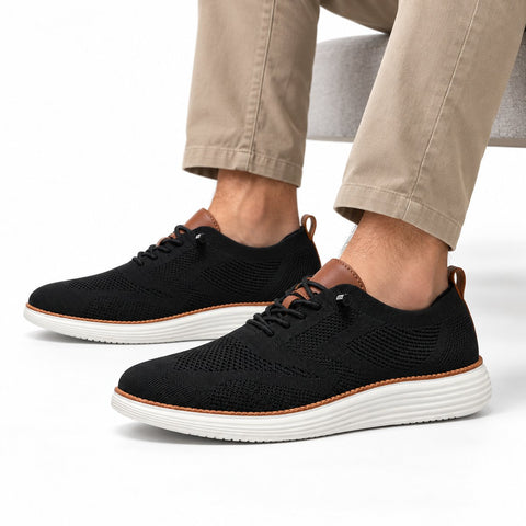 Strider black knit casual shoes with cushioned white soles and subtle lift for a comfortable discreet height boost while walking or standing