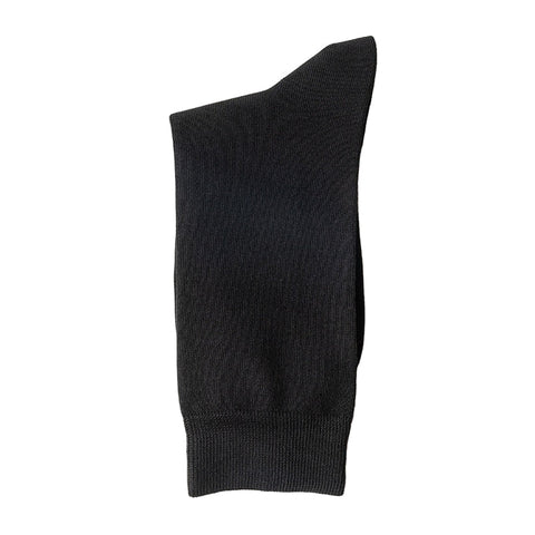 A single black dress sock folded neatly on a white background.