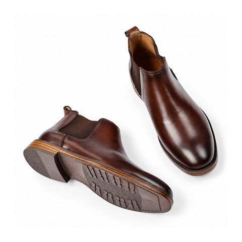 Wellington brown leather Chelsea elevator boots with a block heel, textured rubber sole and a discreet height boost