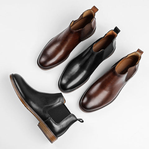 Men's shoes from Modern Elevation packed for travel, showing a versatile two-pair rotation for a trip.