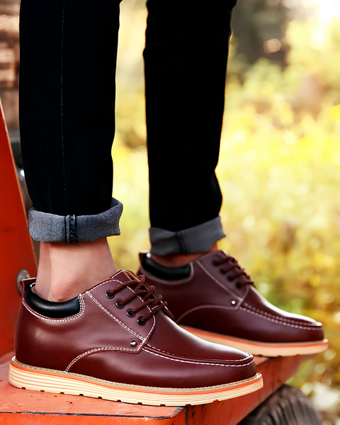 Men's dress shoe from Modern Elevation shown in profile, illustrating how the hidden internal lift stays discreet from the outside.