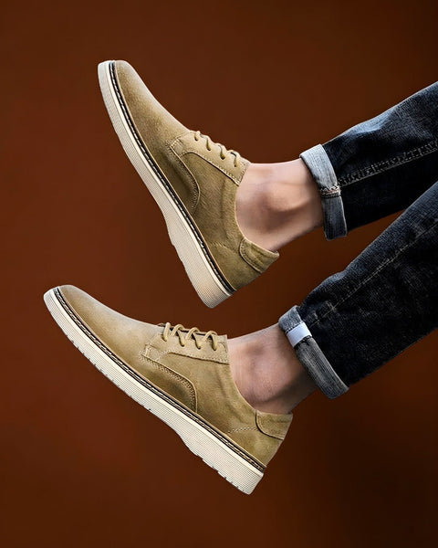 Men's shoes from Modern Elevation worn with everyday trousers, showing how the discreet height boost stays hidden in normal wear.
