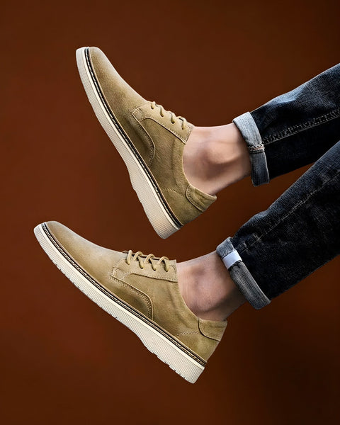 Men's shoes from Modern Elevation worn with everyday trousers, showing how the discreet height boost stays hidden in normal wear.