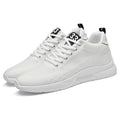 White sneakers with black accents on a white background
