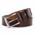 Brown leather belt with a silver buckle on a white background