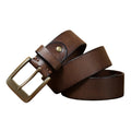 Brown leather belt with brass buckle on a white background