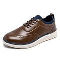 Prescott brown leather men's dress shoe with brogue detailing, navy fabric collar, white sole, and discreet height boost for comfortable elevator footwear.