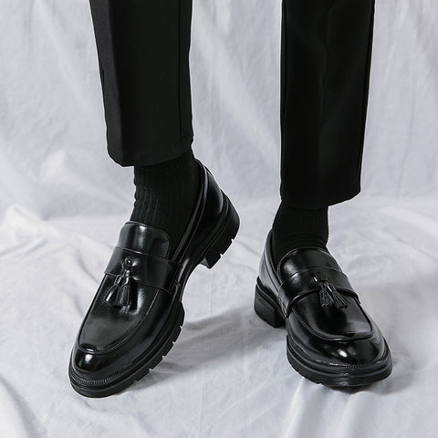 Sterling black polished leather men's dress shoes with tassels, offering a discreet height boost and hidden lift for enhanced confidence and modern style.