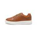 Radcliffe men's casual sneaker in brown leather with a white sole, featuring a discreet height boost and comfortable insoles for an elevated appearance.