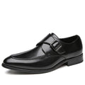 Black leather dress shoe Lennox with polished finish and side buckle, designed as discreet height-increasing footwear for men offering comfort and a subtle lift.