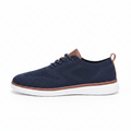 Strider men's sneaker in navy blue knit with discreet height boost, featuring comfortable insoles and brown accents for modern style and elevated confidence.