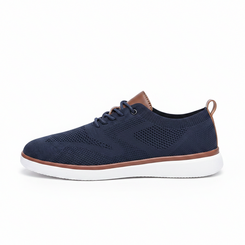Strider men's sneaker in navy blue knit with discreet height boost, featuring comfortable insoles and brown accents for modern style and elevated confidence.