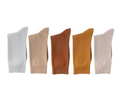 Five pairs of socks in different colors on a white background