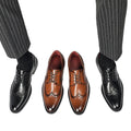 Two pairs of dress shoes, one brown and one black, worn with pinstripe pants on a white background.