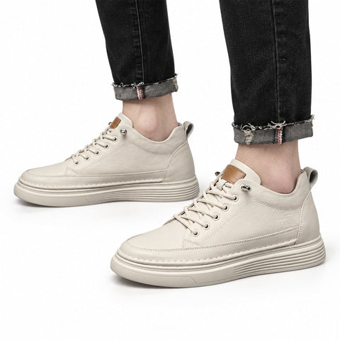 Altura beige casual elevator shoes with a discreet height boost worn with cuffed black jeans for a clean modern look and comfortable everyday style