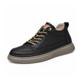 Altura black mens casual sneaker with tan laces and a thick gray sole offering a discreet height boost and comfortable everyday style