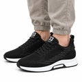 Ascend33 black mens sneakers with breathable knit uppers white cushioned soles and discreet height boost for comfortable everyday wear