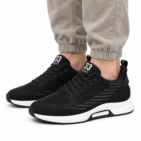 Ascend33 black mens sneakers with breathable knit uppers white cushioned soles and discreet height boost for comfortable everyday wear
