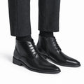 Ashford black men's dress boots with a sleek leather finish, lace up fronts and side zippers designed as discreet height increasing boots