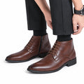 Ashford brown leather mens dress boots with lace up fronts and side zippers styled with tailored trousers for a polished look and discreet height boost