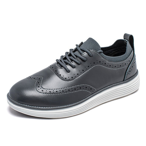 Prescott men's sneaker-style elevator shoe in black leather with perforated detailing, comfortable insoles, and a discreet height boost for a modern, elevated appearance.