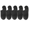 Set of five black socks on a white background