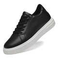 Black sneaker with white sole on a white background