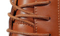 Close-up of a tan Charleston shoe with a hidden internal lift for a discreet height boost.
