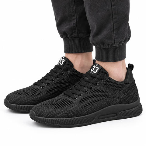Elevate33 black mens sneakers with breathable knit uppers cushioned soles and a discreet height boost for comfortable everyday wear