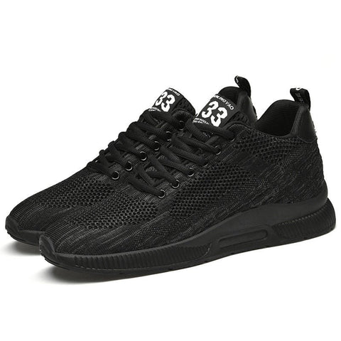 Elevate33 men's sneakers in black with a breathable knit upper, featuring a hidden lift for a discreet height boost.
