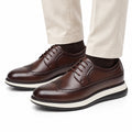 Hartford dark brown leather dress shoes with brogue detailing, lace up design and a discreet height boost