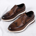 Hartford men's brown wingtip shoes with brogue detailing and a white sole, featuring a hidden lift for a discreet height boost.