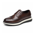 Hartford dark brown leather wingtip dress shoe with lace up design, layered sole and a discreet height boost