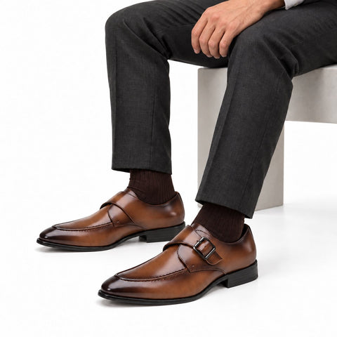 Lennox brown leather monk strap elevator dress shoes with a discreet height boost worn with charcoal trousers