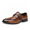 Lennox brown leather dress shoe featuring a sleek apron toe and monk strap buckle with a polished finish and discreet height boost for formal style