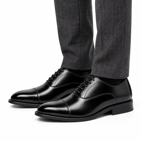 Monarch black men's dress shoes with polished cap toes lace up design and discreet height boost for a refined professional look