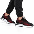Retro33 black and red mens sneakers with textured knit uppers and white cushioned soles shown with black joggers for a sporty elevated look