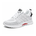 Rise33 white performance sneaker with breathable mesh upper and cushioned sole for comfortable everyday wear with a discreet height boost