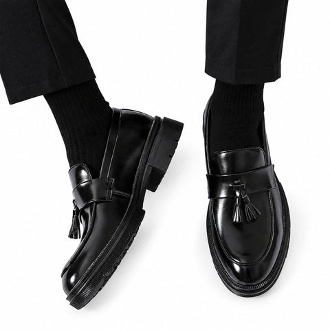 Sterling black mens dress loafers with polished leather finish tassel details and a discreet height boost for refined formal style