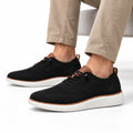 Strider black knit casual shoes with cushioned white soles and subtle lift for a comfortable discreet height boost while walking or standing